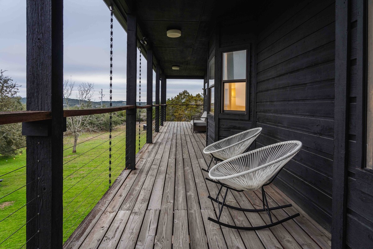 Upper balcony with rocking chairs